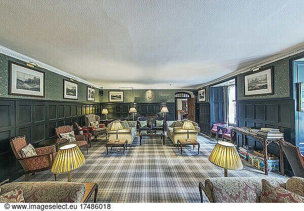 Hotel lounge with Scottish themed decoration  including tartan carpet.