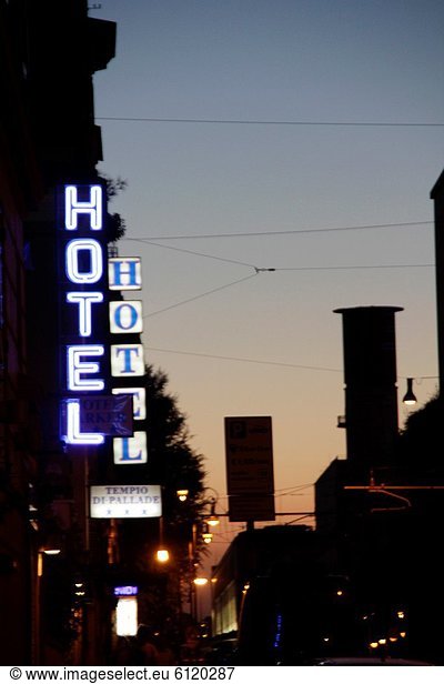 hotel sign at night in rome italy