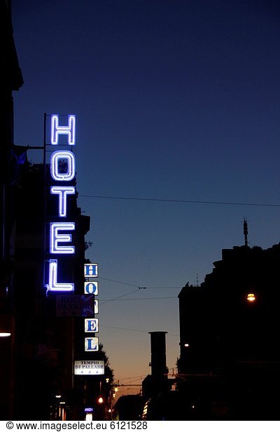 hotel sign at night in rome italy