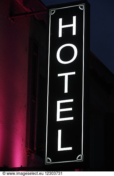 Hotel sign at night. Strasbourg. France.