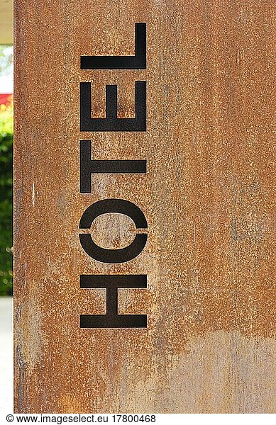 Hotel sign  corten steel with patina  structural steel  Gasthof Herrmann  letters  script  Münsingen in the Swabian Alb  Baden-Württemberg  Germany  Europe