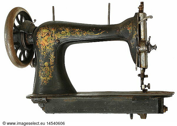 household  household appliances  mechanic sewing machine  Seidel and Naumann  Dresden  Saxony  Germany  circa 1889  historic  historical  1880s  19th century  founded 1874  machines  technic  technics  clipping  cut out  Made in Germany  antiquity  antiquities  cut-out  cut-outs  people