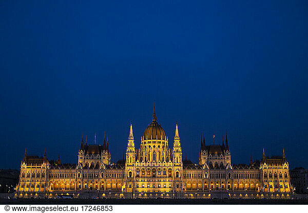 Hungarian Parliament building illuminated at night in Budapest  Hungary