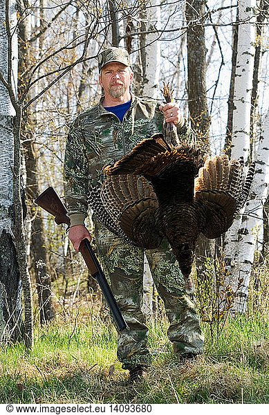 Hunter with Wild Turkey