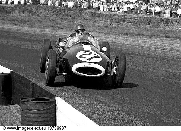 Ian Burgess worked at the Cooper Car Company as sales manager  very creative methods  ended up in Ford Open Prison  rear-engined car has water-cooled Coventry Climax T43 4-cylinder engine. Silverstone  England 1958.