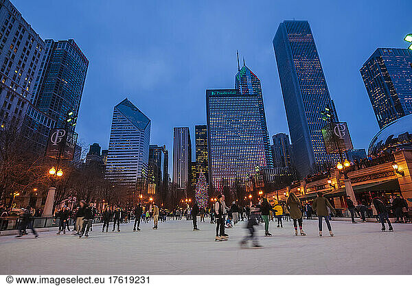 Ice skating at Millennium Park at dusk in Chicago  Illinois  USA; Chicago  Illinois  United States of America