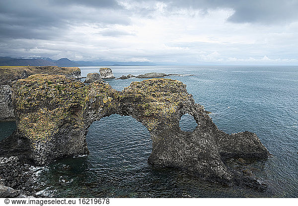 Iceland  Arnarstarpi  View of natural arch in sea