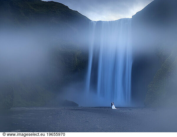 Iceland landscape covered by fog at Skogafoss waterfall