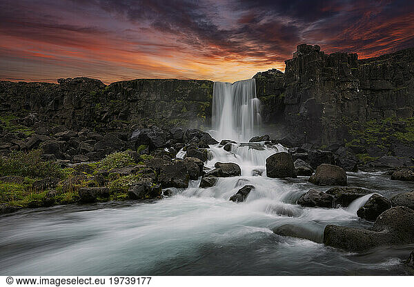 Iceland  Sudurland  Long exposure of Oxararfoss waterfall at dusk