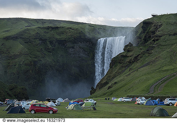 Iceland  tent camp at Skogafoss waterfalll