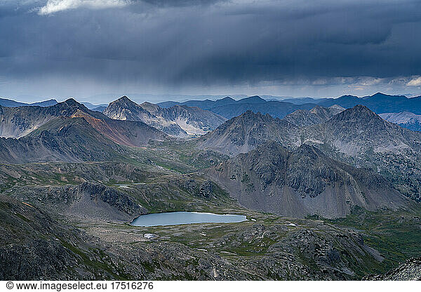 Idyllic shot of mountain range against cloudy sky