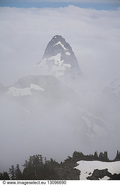 Idyllic view of Mount Habrich amidst cloudy sky during winter