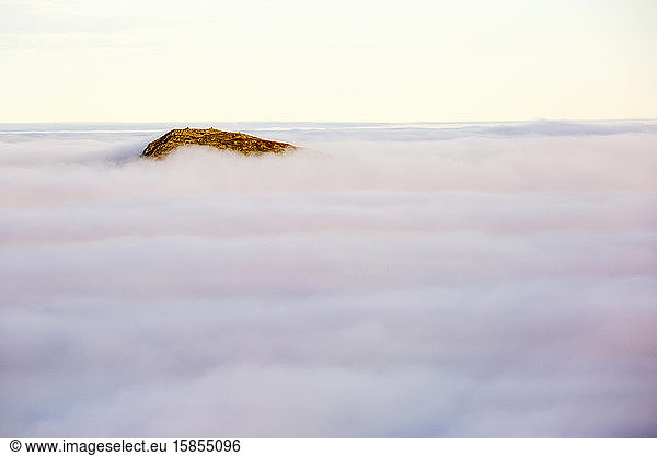 Ill Bell from Red Screes in the Lake District  Cumbria  UK  with valley cloud caused by a temperature inversion.