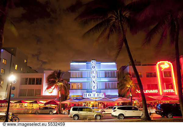 Illuminated Art Deco hotels along famous Ocean Drive in South Beach  Miami Beach  Florida  USA