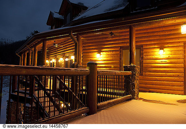 Illuminated cabin at night