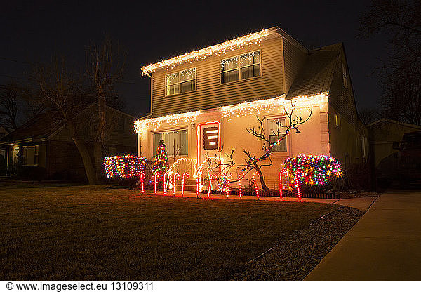 Illuminated house during Christmas at night