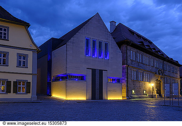 Illuminated Knauf-Museums Iphofen against sky at dusk