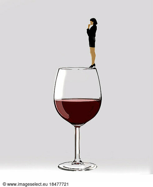 Illustration of woman standing on rim of large wineglass