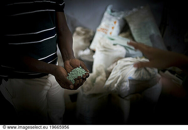 In an all-female cooperative  plastic is collected from streets and finely cut to be able to recycle.