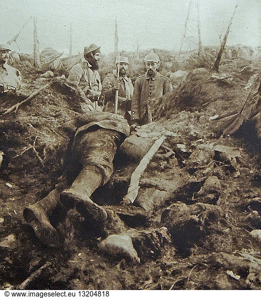 In September 1914  after the initial advance into France had been halted  the Germans once again went on the offensive  capturing land south of Verdun  an area that would be known as the St. Miheil Salient. The Germans strongly fortified the Butte des Eparges to the east of the town of Eparges. Dead German soldier is watched by on guard German soldiers at the town of Eparges 1914