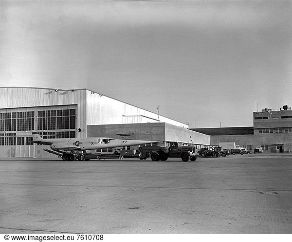 In this NACA High_Speed Flight Station photograph  the X_3 Stiletto is seen being towed behind the NACA hangar located on Edwards Air Force base towards the lakebed. The X_3 Stiletto was a single_place jet aircraft with a slender fuselage and a long tapered nose  manufactured by the Douglas Aircraft Company. The X_3´s primary mission was to investigate the design features of an aircraft suitable for sustained supersonic speeds  which included the first use of titanium in major airframe components. It was delivered to the NACA High_Speed Flight Station in August of 1954 after some Douglas and Air Force evaluation testing.