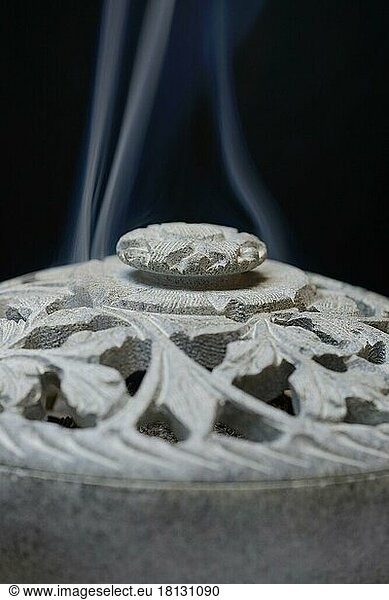 Incense burner with smoke
