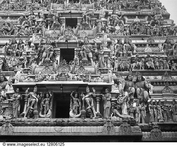 INDIA: HINDU TEMPLE. The richly carved stone tower of the ...