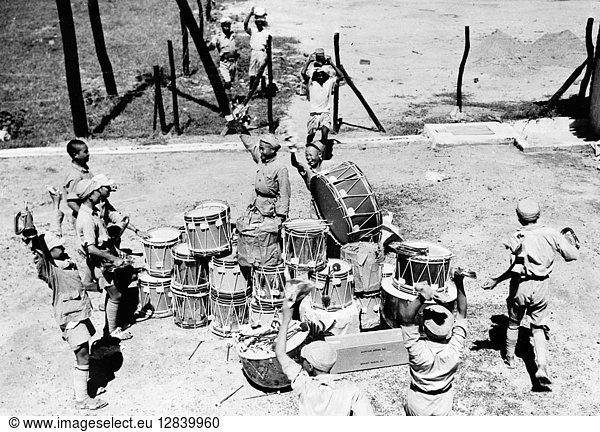 INDIA: SOLDIERS  c1942. Chinese soldiers of the United Nations forces in India express their pleasure upon receiving a shipment of regimental drums and bugles. Photographed in c1942.