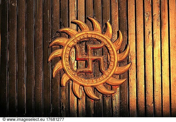 India  the sun wheel  a swastika  lucky charm  is a cross symbol with bent or curved arms  sun sign of the sun deity  North India  India  Asia