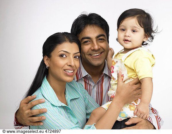 Indian parent with baby girl close to each other MR702O 702A 702L