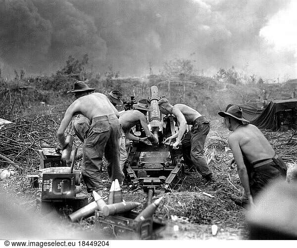 Indonesia: Australian soldiers of the Second Australian Imperial Force use a 25-pounder field gun to pound Japanese positions during the Battle of Balikpapan  Borneo  Dutch East Indies (now part of East Kalimantan)  July 1945The Battle of Balikpapan was the concluding stage of Operation Oboe. The landings took place on 1 July 1945. The Australian 7th Division  composed of the 18th  21st and 25th Infantry Brigades  with Dutch East Indies troops  made an amphibious landing a few miles north of Balikpapan  on the island of Borneo. The landing had been preceded by heavy bombing and shelling by Australian and US air and naval forces. The Japanese were outnumbered and outgunned  but like the other battles of the Pacific War  many of them fought to the death.Major operations had ceased by July 21. The 7th Division's casualties were significantly lighter than they had suffered in previous campaigns. The battle was one of the last to occur in World War II  beginning a few weeks before the bombing of Hiroshima and Nagasaki effectively ended the war. Japan surrendered while the Australians were combing the jungle for stragglers. Pictures From History