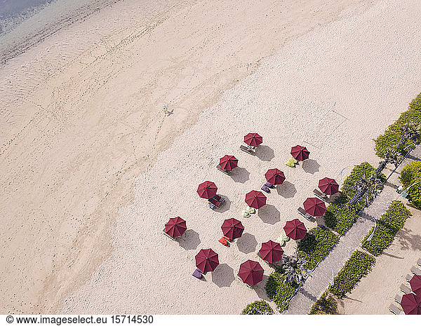 Indonesia  Bali  Nusa Dua  Aerial view of umbrellas on beach