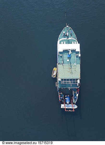 Indonesia  Bali  Serangan  Aerial view of fishing boat floating in blue sea water