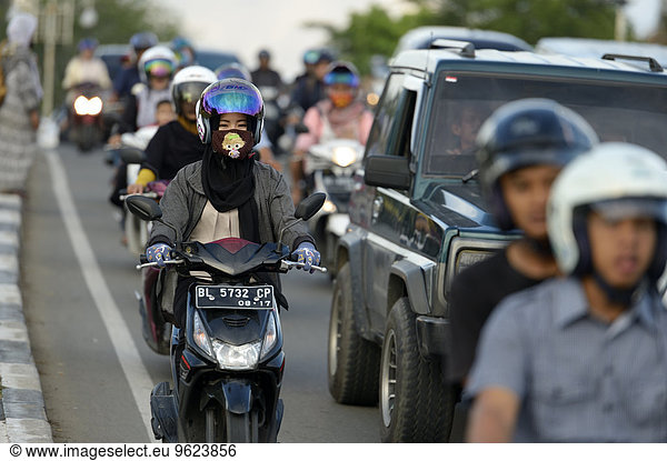 Indonesia  Banda Aceh  moped drivers in rush hour