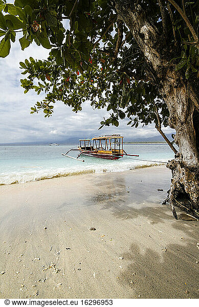 Indonesia  Lombok  Isle Gili Air  traditional wooden boat at beach