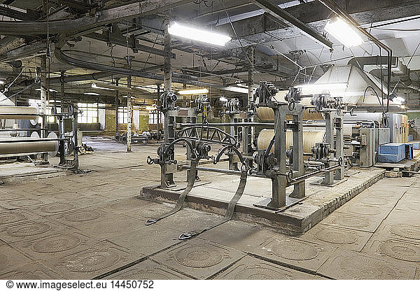 Industrial looms in textile factory