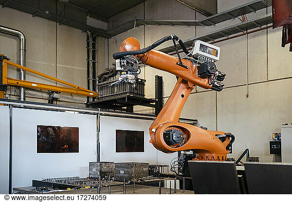 Industrial robots welding in factory