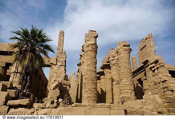 Inner view of a temple and carved pillars of the great hypostyle hall in the Precinct of Amon Re  Situated at Karnak Temple complex  Comprises a vast mix of decayed temples  chapels  pylons and other buildings  Luxor  Egypt.