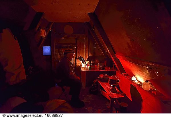 Inside a hut in Greenland  Red light to avoid being dazzled  Greenlande  February 2016