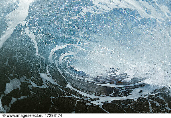 Inside a wave breaking on a beach