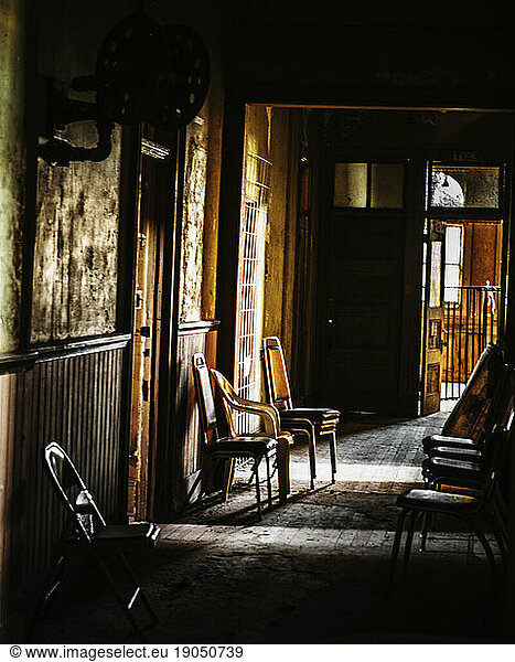 Interior hallway of a dilapidated building.