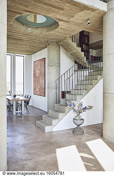 Interior of a loft flat with concrete stairs