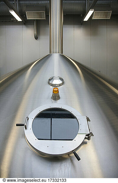 Interior of brewery  large steel storage tanks for brewing beer