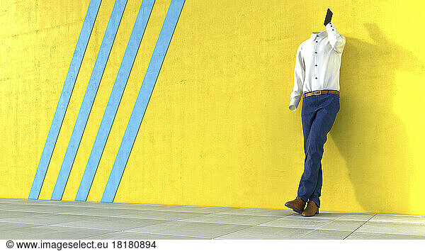 Invisible person talking on phone in front of yellow wall