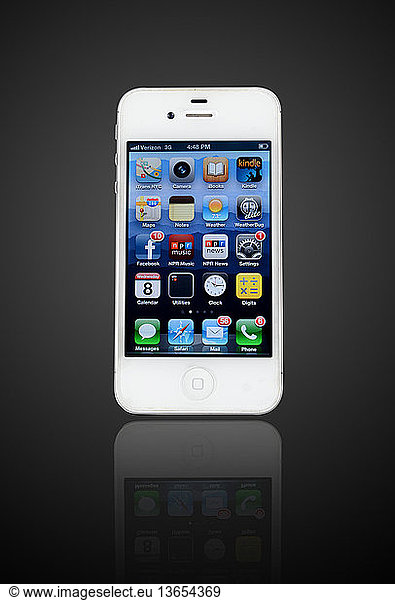 iPhone on dark background.