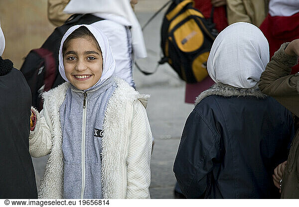 Iranian girls on a school field trip to Imam mosque in Esfahan  Iran.