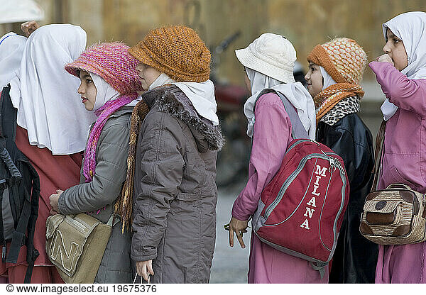 Iranian girls on a school field trip to Imam mosque in Esfahan  Iran.
