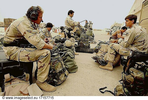 IRAQ -- 27 Mar 2003 -- US Air Force combat control pararescuemen and officers  perform operational readiness checks on their equipment before deploying to an undisclosed location in support in Iraq. US Air Force photo (Released) -- Picture by Quinton T Burris / Lightroom Photos / USAF.
