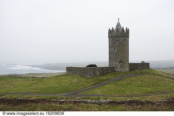 Ireland  Doonagore Castle on a hill