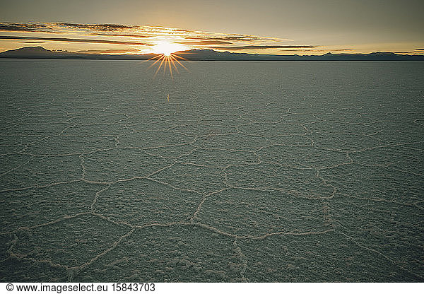 Irregular structures of salt at sunrise